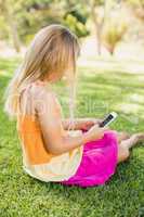 Young girl using mobile phone