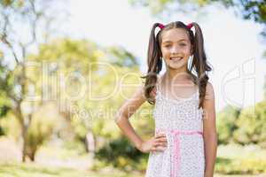 Young girl smiling in park