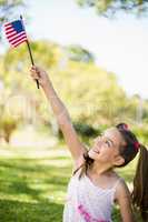 Girl holding an American flag