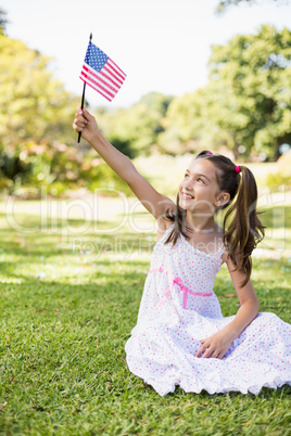 Girl holding an American flag