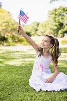 Girl holding an American flag