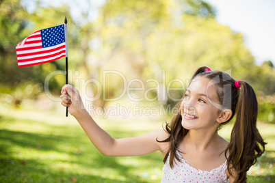 Girl holding an American flag