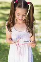 Girl testing diabetes on glucose meter