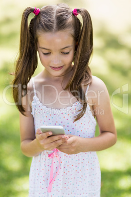 Young girl using mobile phone