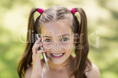 Young girl talking on mobile phone