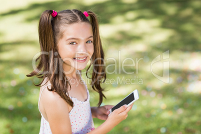 Young girl using mobile phone