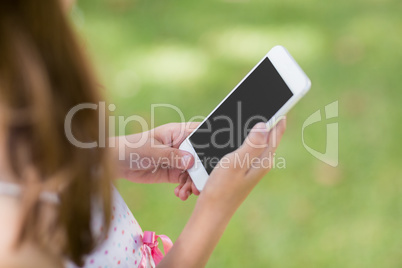 Young girl using mobile phone