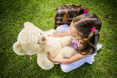 Young girl with a teddy bear