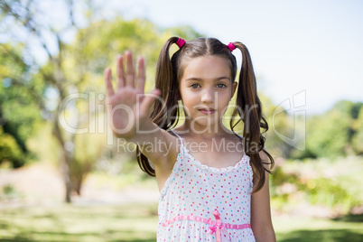 Upset girl showing her hand