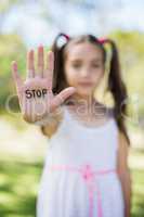 Girl making stop sign with her hand