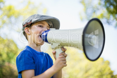 Young boy speaking on megaphone