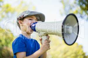 Young boy speaking on megaphone