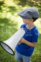 Young boy holding a megaphone