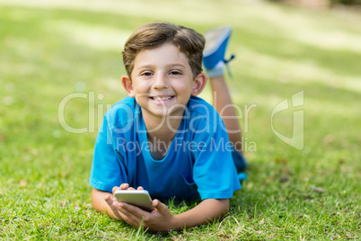 Young boy using mobile phone