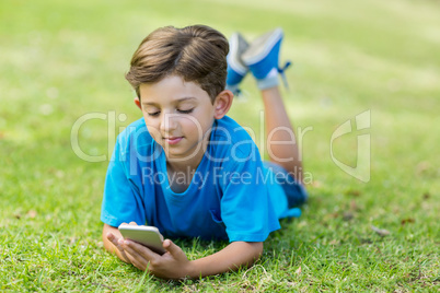 Young boy using mobile phone