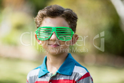 Young boy wearing shutter shades