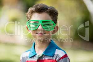 Young boy wearing shutter shades