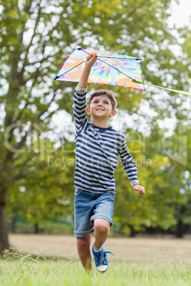 Boy playing with kite