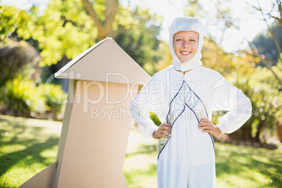 Portrait of smiling boy pretending to be an astronaut