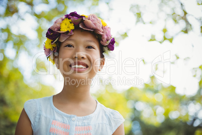 Girl smiling in park alone