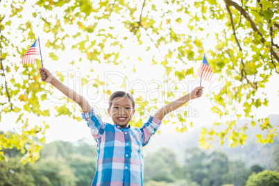 Girl holding an American flag