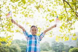 Girl holding an American flag