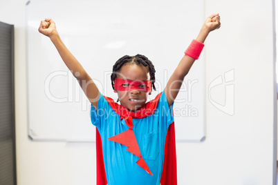 Boy pretending to be a superhero