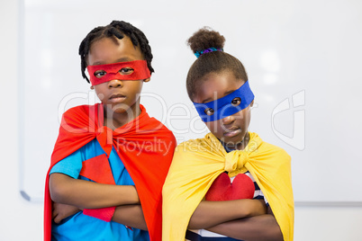 Boy and girl pretending to be a superhero