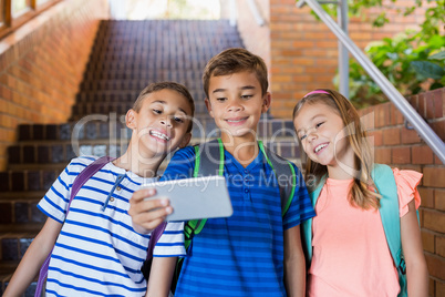 School kids taking selfie from mobile phone