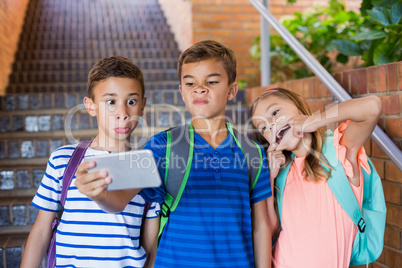 School kids taking selfie from mobile phone
