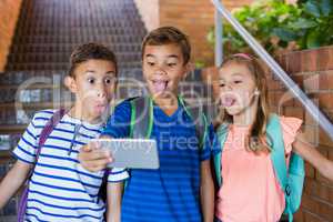 School kids taking selfie from mobile phone