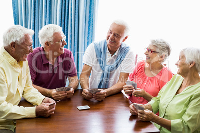 Seniors playing cards together