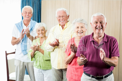 Seniors clapping hands