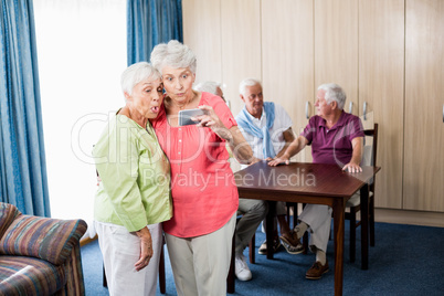 Senior women taking a selfie