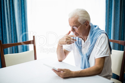 Senior using a tablet