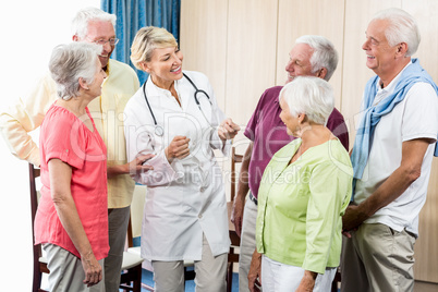 Seniors looking at nurse Seniors looking at nurse
