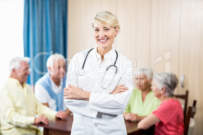 Nurse standing with arms crossed