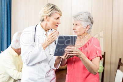 Nurse talking to a senior woman Nurse talking to a senior woman