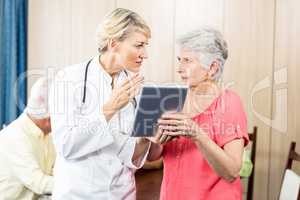 Nurse talking to a senior woman