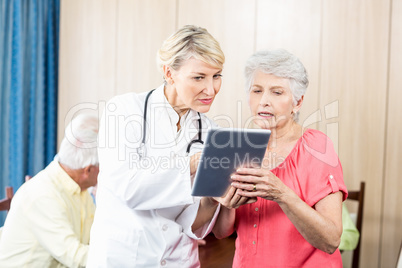 Nurse talking to a senior woman