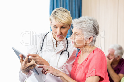 Nurse talking to a senior woman