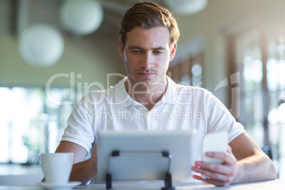 Man using digital tablet