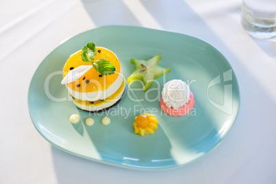 Plate of dessert on restaurant table