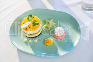 Plate of dessert on restaurant table