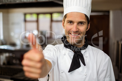 Portrait of smiling chef showing thumbs up Portrait of smiling chef showing thumbs up