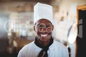 Portrait of smiling head chef