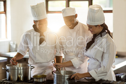 Head chef working together with her colleague