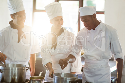 Head chef working together with her colleague