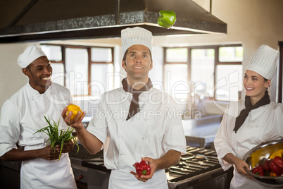 Chef playing with vegetables