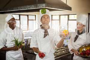 Chef playing with vegetables